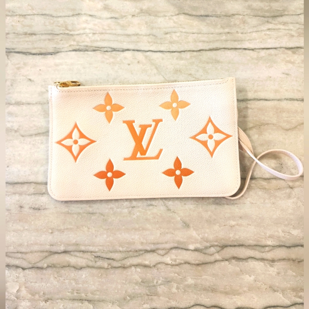 Empreinte Monogram louis vuitton pochette orange.